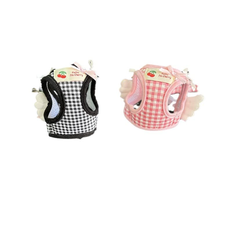 Black and pink winged gingham pet harnesses on a white background